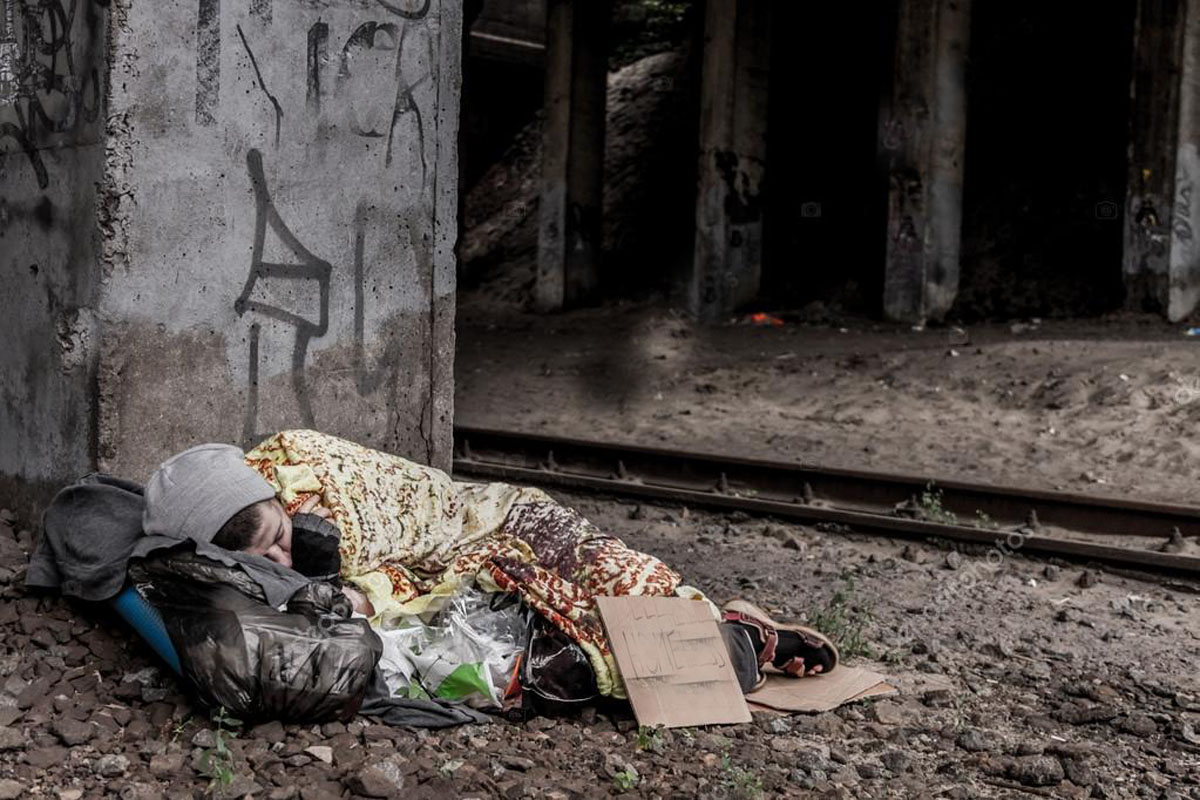 depositphotos 124417468 stock photo homeless woman sleeping